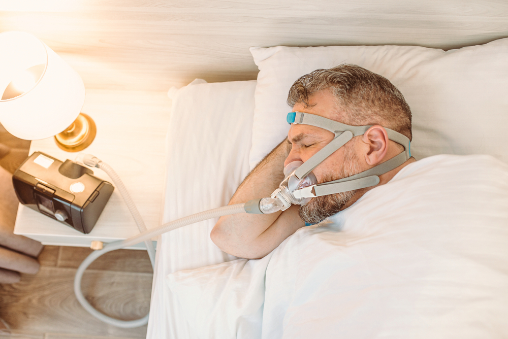 a man uses CPAP but worries about its affect on his oral health