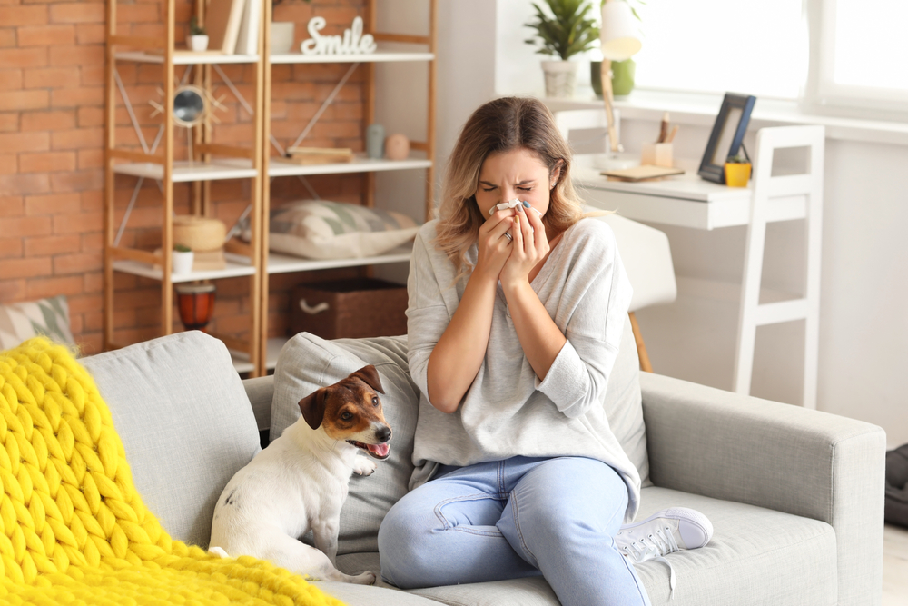 a woman is suffering the effects of allergies and sleep apnea